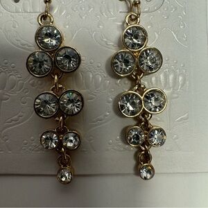 NWT. Rhinestones gold tone dangle earrings.